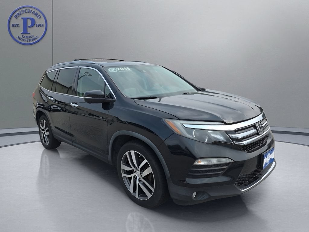 2016 Honda Pilot Elite in Black — front three-quarter view